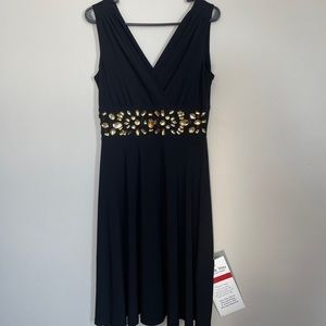 Ronni Nicole black dress with gold/ yellow beading. Size 8